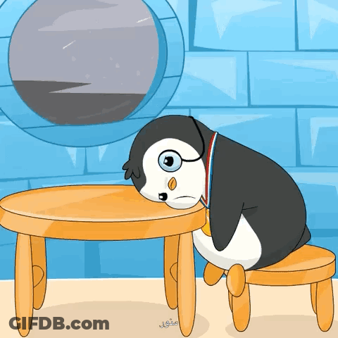 Penguin Sitting At Table With Medal GIF