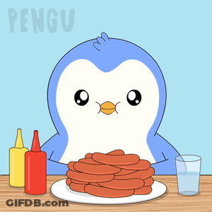 Penguin Sitting At Table With Pancakes And Condiments GIF
