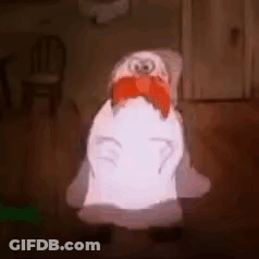 Penguin Sitting In Chair With Red Bow Tie GIF