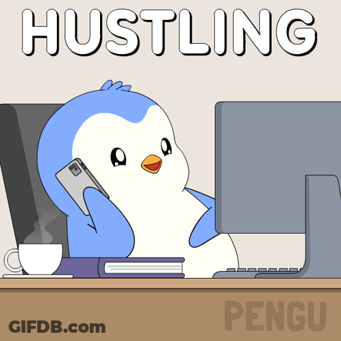 Penguin Talking On Cell Phone In Front Of Computer Hustling GIF