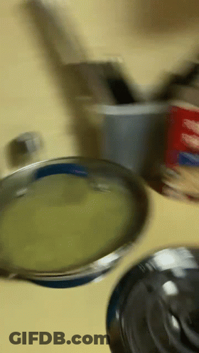 Penguin With Mohawk Talking On Blue Phone GIF