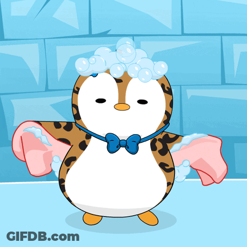 Penguin With Soap Bubbles And Pink Towel GIF