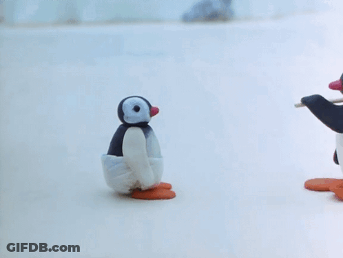 Penguins Standing Next To Each Other GIF