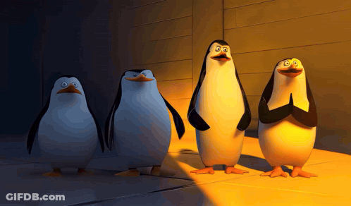 Penguins Standing With Hands Folded GIF
