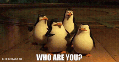 Penguins Standing With Who Are You Caption GIF