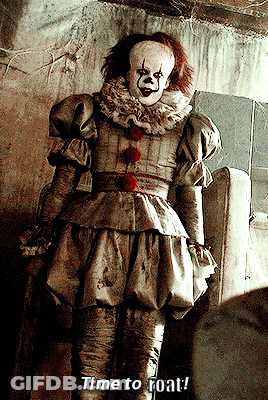 Pennywise The Clown Saying Time To Float In Dark Room GIF