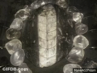 Pentagram Surrounded By Crystals GIF