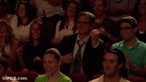People Applauding Show In Theater GIF