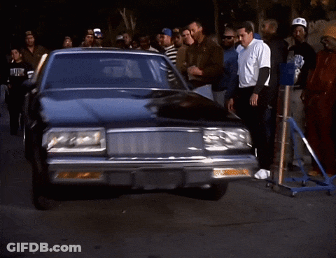 People Around Black Car With NYC Plate GIF