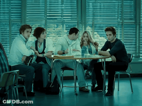 People At Table With Coca Cola Bottle GIF