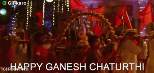People Carrying Ganesha Statue On A Carriage GIF