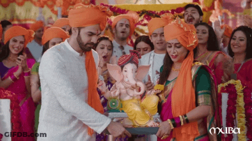 People Carrying Ganesha Statue On Carriage GIF