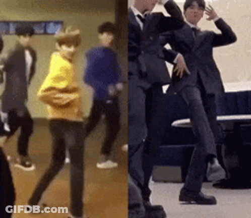 People Dancing And Man In Suit Beside Table GIF
