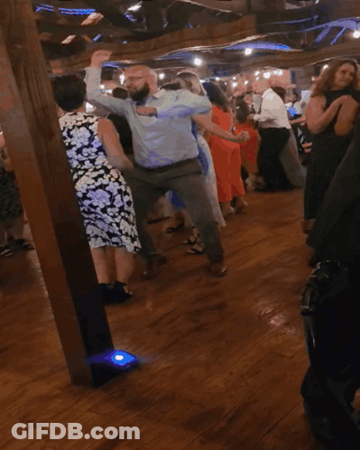 People Dancing In Blue Light GIF