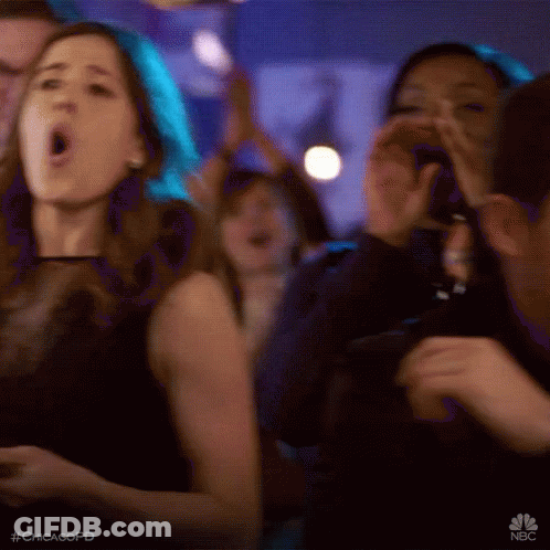 People Dancing In Club With Phone GIF