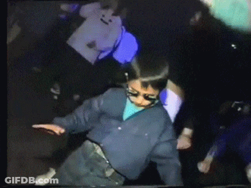People Dancing In Dark Room With Sunglasses GIF