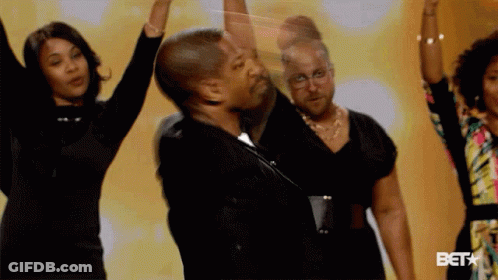 People Dancing In Front Of Bet Logo GIF