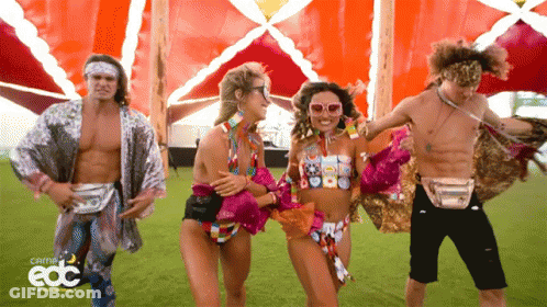 People Dancing In Front Of EDC Sign GIF