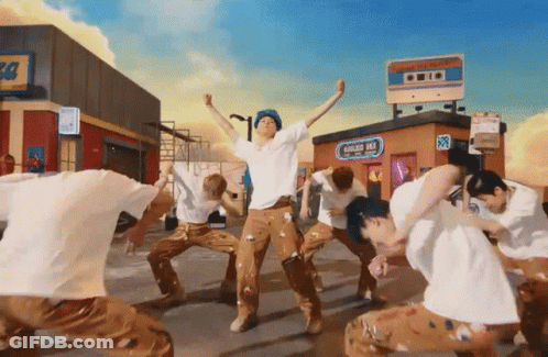 People Dancing In Front Of Golden Inn GIF