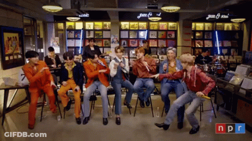 People Dancing In Front Of NPR Sign GIF