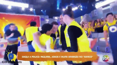 People Dancing In Front Of SBT Sign GIF