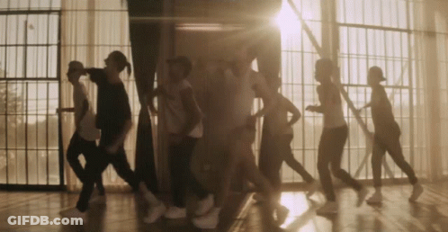 People Dancing In Front Of Window GIF
