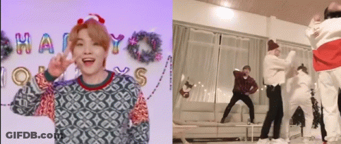 People Dancing In Living Room With Christmas Wreath GIF