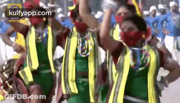 People Dancing In Parade With Kulfyapp.com Watermark GIF