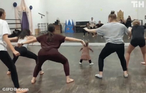People Dancing In Room With Th Letters GIF