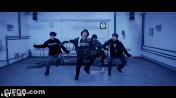 People Dancing In Room With Wall Fan GIF