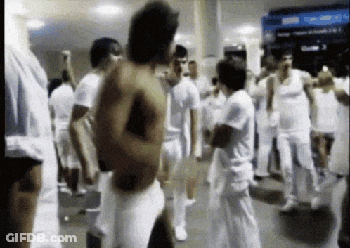 People Dancing In White Clothes GIF