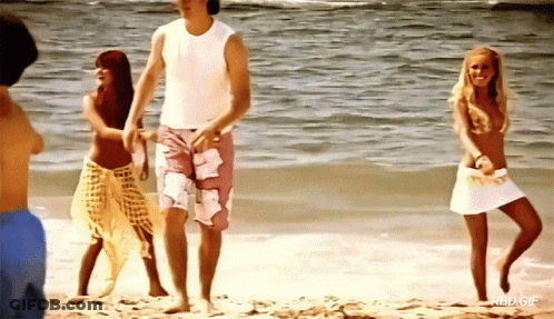 People Dancing On Beach Saying Red GIF