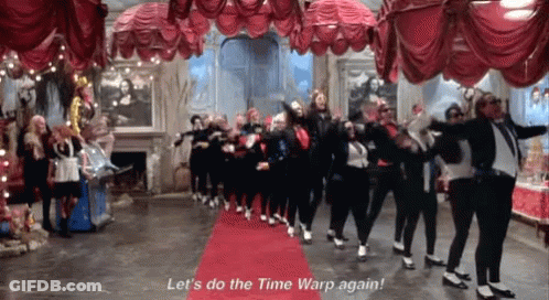 People Dancing On Red Carpet Let's Do The Time Warp Again GIF