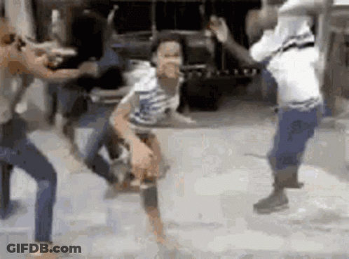 People Dancing On Street In Front Of Truck GIF