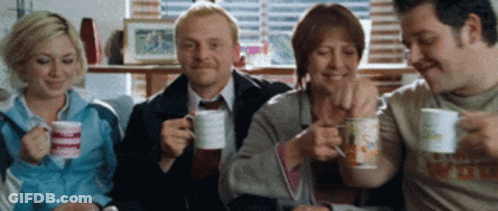 People Drinking Coffee And Smiling GIF