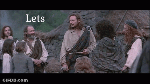 People Gathered Around Man In Kilt Saying Lets GIF