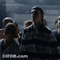 People Gathered Dark Room La Guerre Film Festival GIF