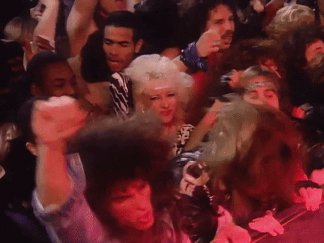 People Headbanging Altogether GIF