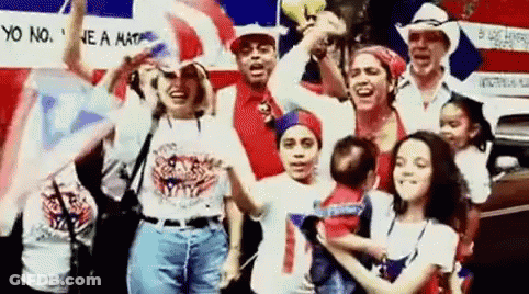 People Holding Flags And Baby By Car GIF