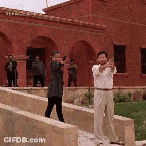 People Holding Guns At Reface App Building GIF