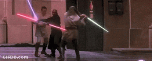 People Holding Lightsabers GIF