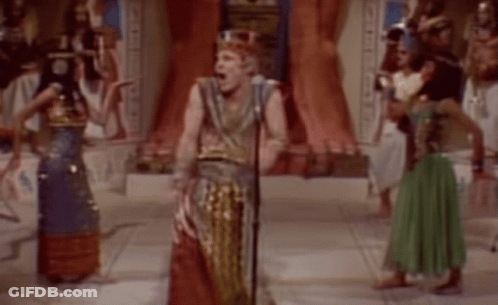 People In Ancient Egyptian Costumes Dancing GIF