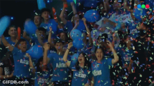 People In Blue Shirts Saying Flying Flowers GIF