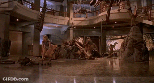 People In Front Of Dinosaur GIF