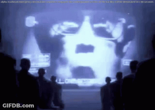 People In Front Of Screen Saying Alpha Manhead Emergency Demolition GIF