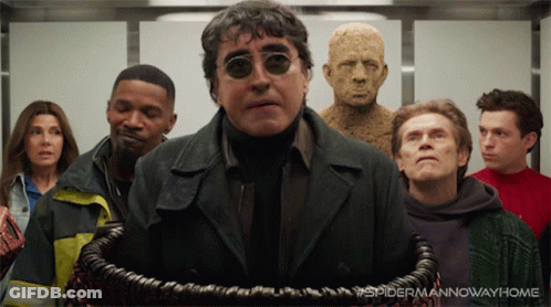 People In Front Of Spider Man Now Way Home Statue GIF