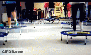 People Jumping On Trampolines GIF