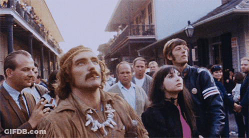 People Looking Up On Street GIF