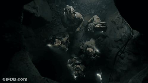 People Lying In Cave Looking Up GIF