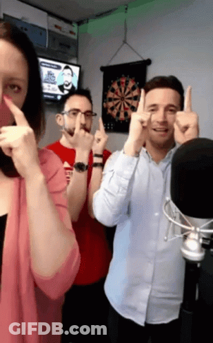 People Making Funny Faces At Dart Board GIF